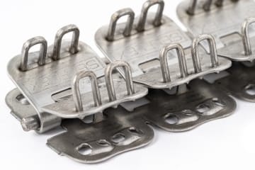 Hinged And Stapled Fastener