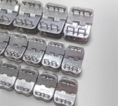Hinged And Stapled Fastener