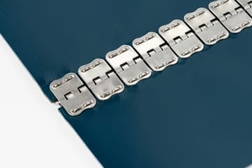 Hinged And Stapled Fastener